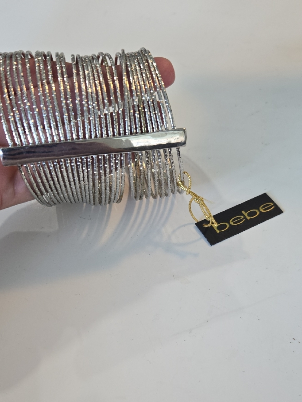 bebe Shimmering Silver Multi-Band Cuff Bracelet